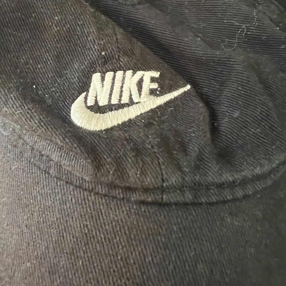 Nike Black kids hat. 19” circumference